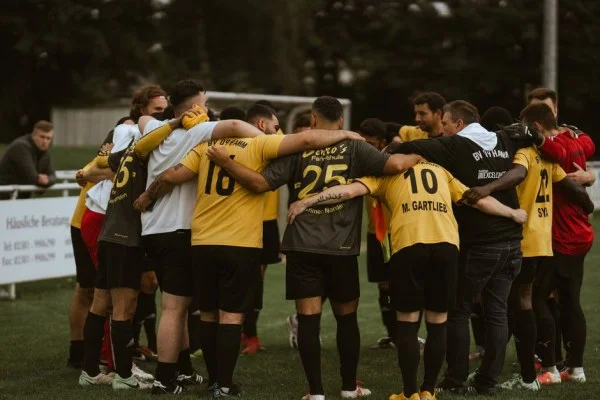 soccer team huddle